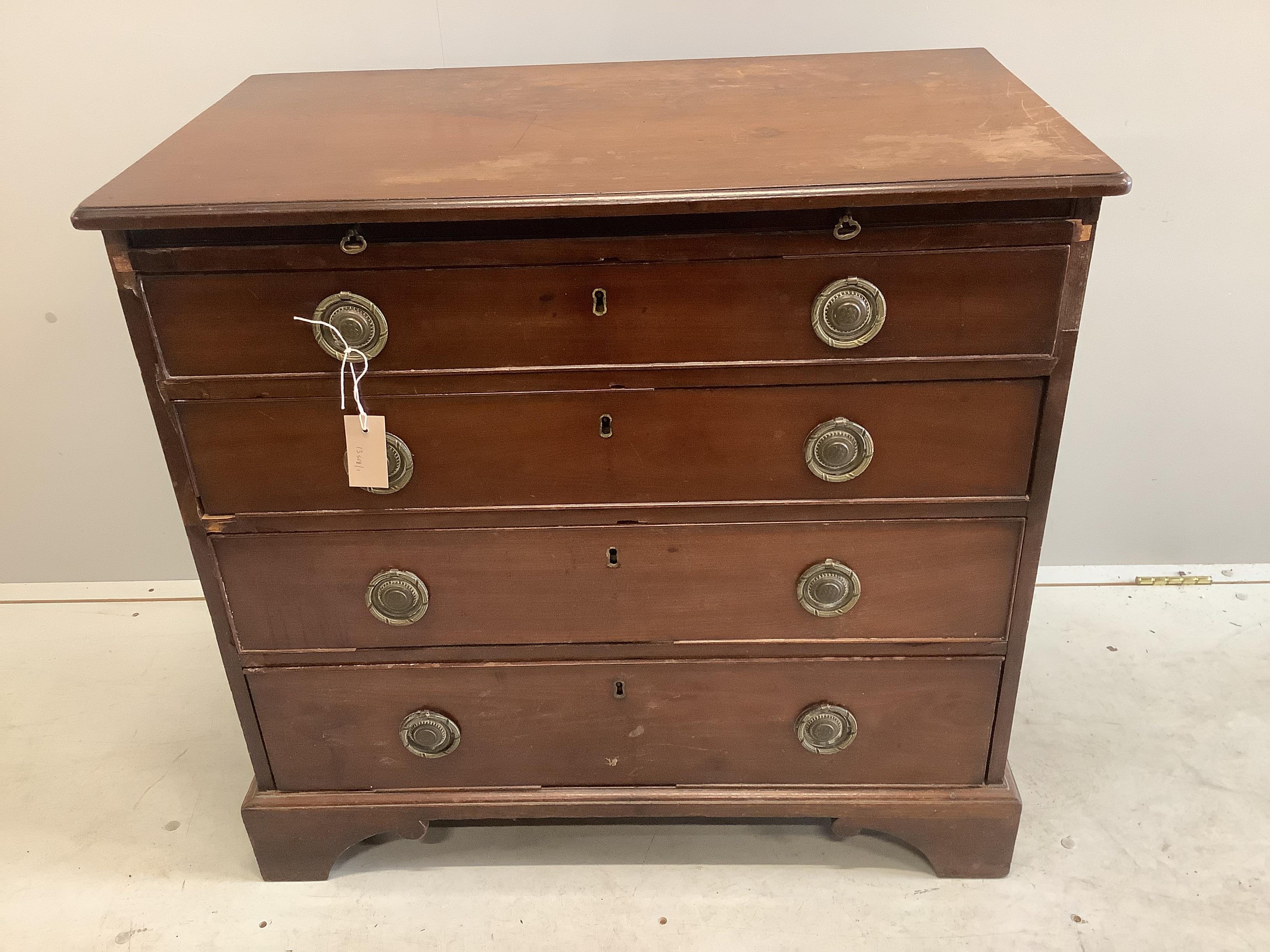 A small early 19th century four drawer mahogany chest with brushing slide, width 83cm, depth 47cm, height 78cm